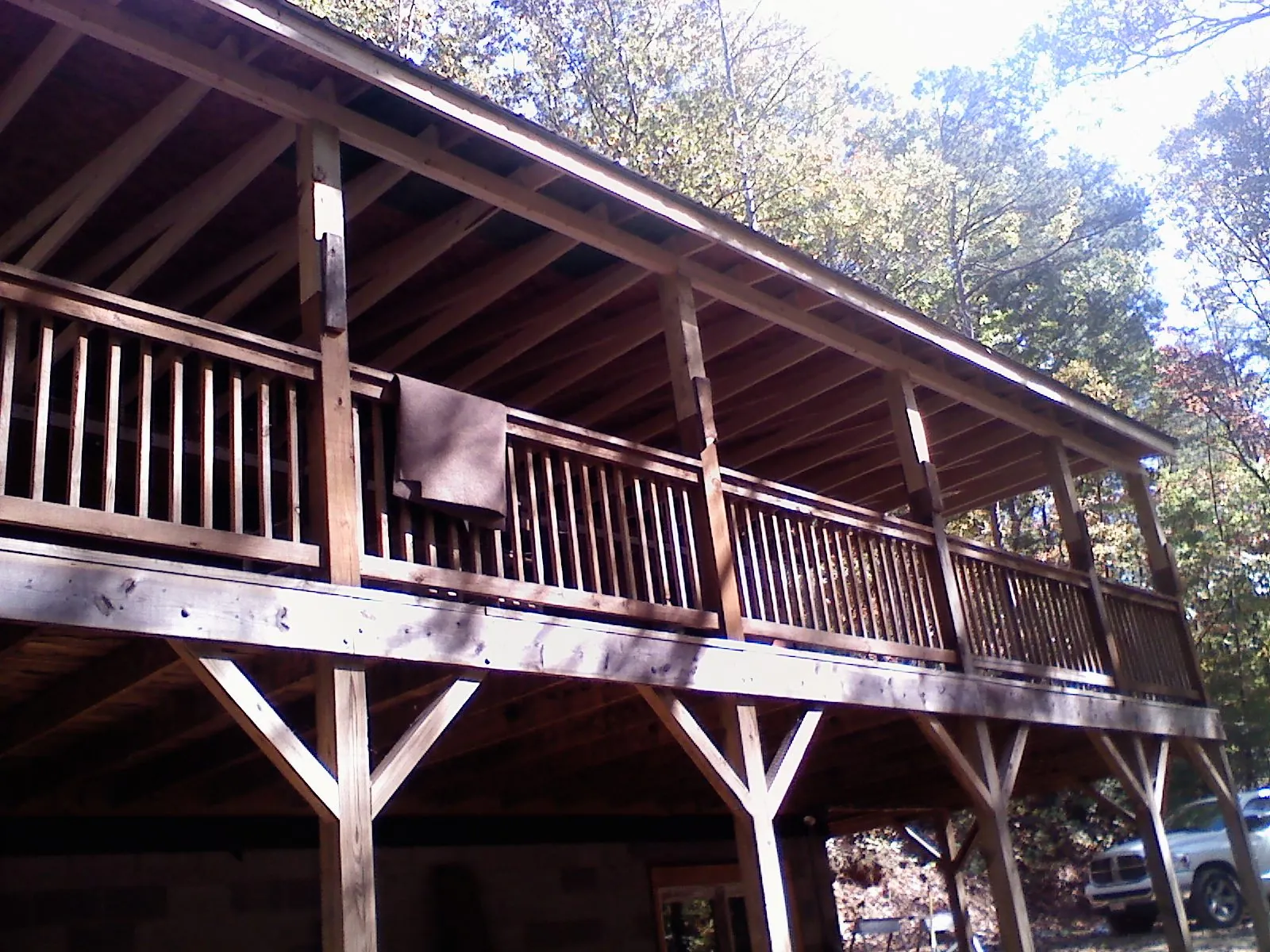 Timber framing under a new elevated porch and deck — Roof Leak Repair in Stroh by Roofing Brothers